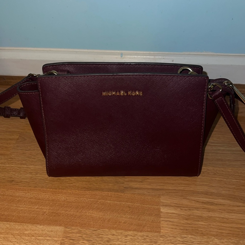 Burgundy Micheal Kors crossbody bag